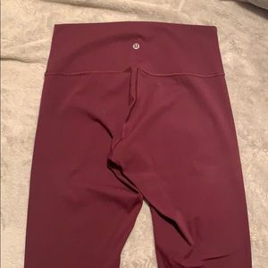 Lulu Lemon maroon crop leggings.